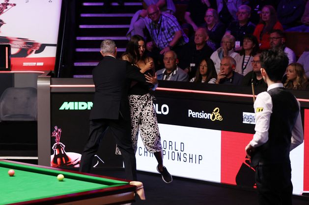 Female spectator physically ejected by ref in disrupted start to World Championship final at the Crucible