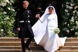 thumbnail: Britain's Prince Harry, Duke of Sussex and Meghan, Duchess of Sussex exit St George's Chapel in Windsor Castle after their royal wedding ceremony,  in Windsor, Britain, May 19, 2018. NEIL HALL/Pool via REUTERS