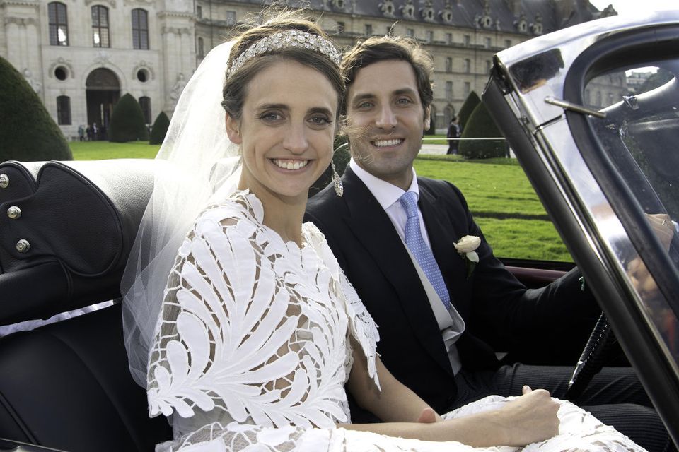 Prince Jean-Christophe Napoleon and his wife Olympia Von Arco-Zinneberg pose in a car at the end of their wedding at Les Invalides on October 19, 2019 in Paris, France. (Photo by Luc Castel/Getty Images)