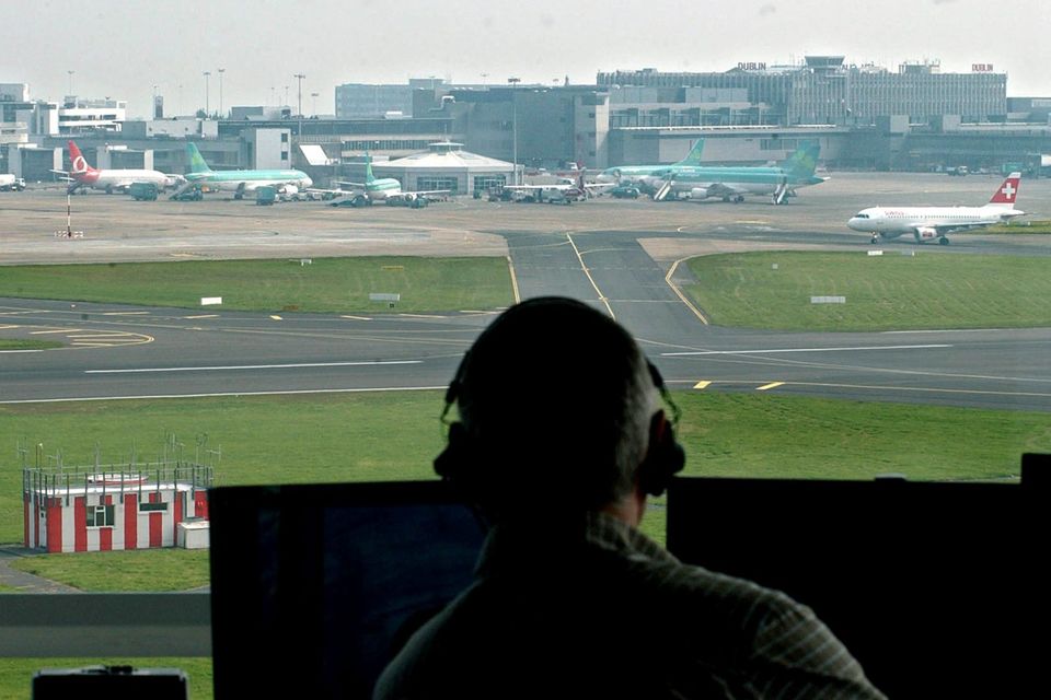 Surface movement controller John Kavanagh works in the Watch Tower of the Irish Aviation Authority's new Air Traffic Control Centre at Dublin Airport,  Ireland, Monday, April 25, 2005. Photographer:  John Cogill/Bloomberg News.
