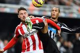 thumbnail: Sunderland striker Connor Wickham is challenged by Newcastle United's Yoan Gouffran during their Premier League clash at St James' Park. Photo: Laurence Griffiths/Getty Images