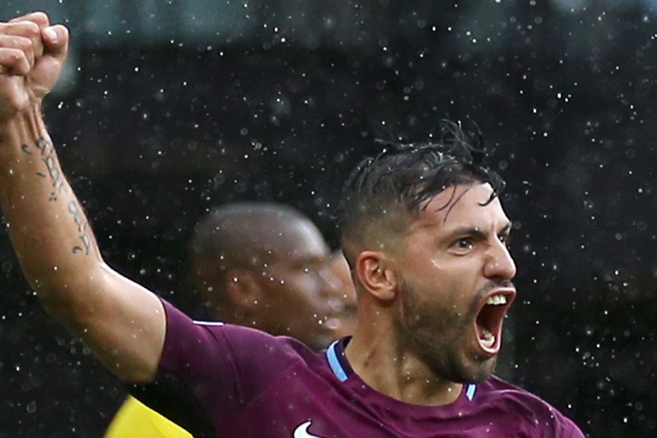 Manchester City's Sergio Aguero roars with delight after his opener