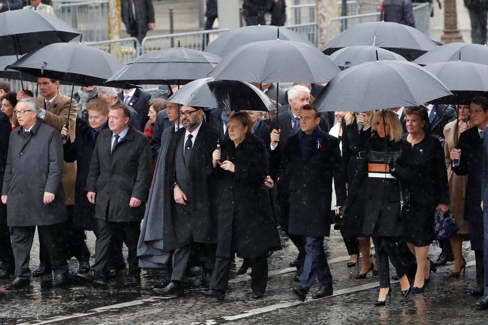 French President Emmanuel Macron, his wife Brigitte, German Chancellor Angela Merkel, Canada's Prime Minister Justin Trudeau, Lithuania's President Dalia Grybauskaite, King Felipe VI of Spain, Denmark's Prime Minister Lars Lokke Rasmussen, European Commission President Jean-Claude Juncker and other heads of states and governments arrive to attend a commemoration ceremony for Armistice Day
 REUTERS/Yves Herman