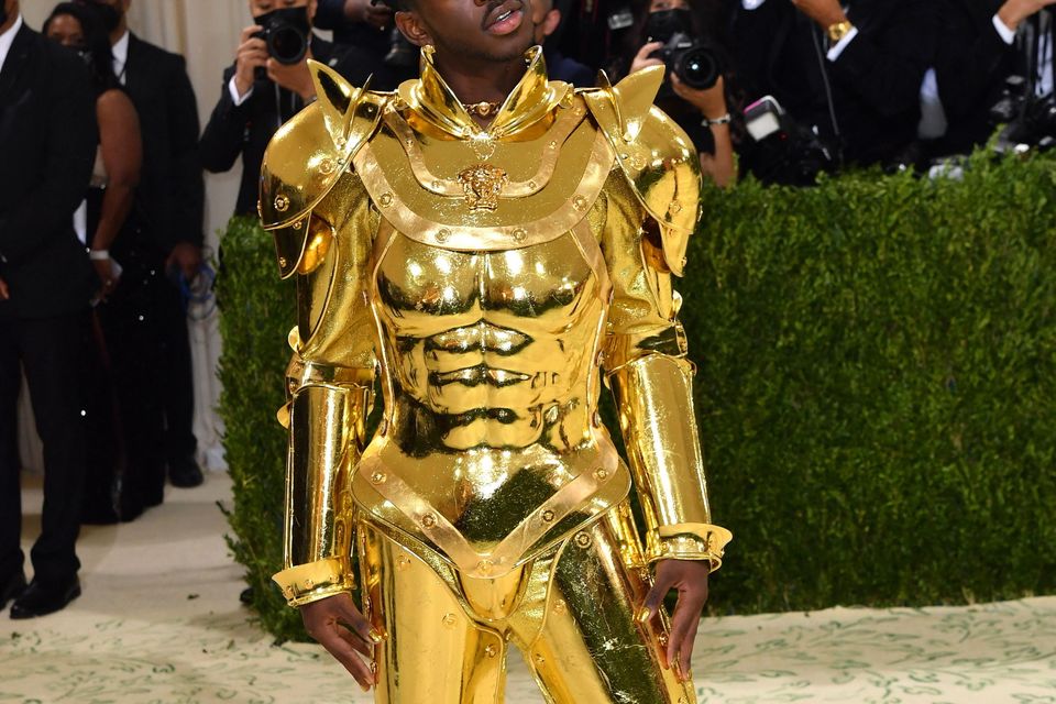 US rapper Lil Nas X arrives for the 2021 Met Gala at the Metropolitan Museum of Art on September 13, 2021 in New York. - This year's Met Gala has a distinctively youthful imprint, hosted by singer Billie Eilish, actor Timothee Chalamet, poet Amanda Gorman and tennis star Naomi Osaka, none of them older than 25. The 2021 theme is "In America: A Lexicon of Fashion." (Photo by Angela WEISS / AFP) (Photo by ANGELA WEISS/AFP via Getty Images)  MET GALA