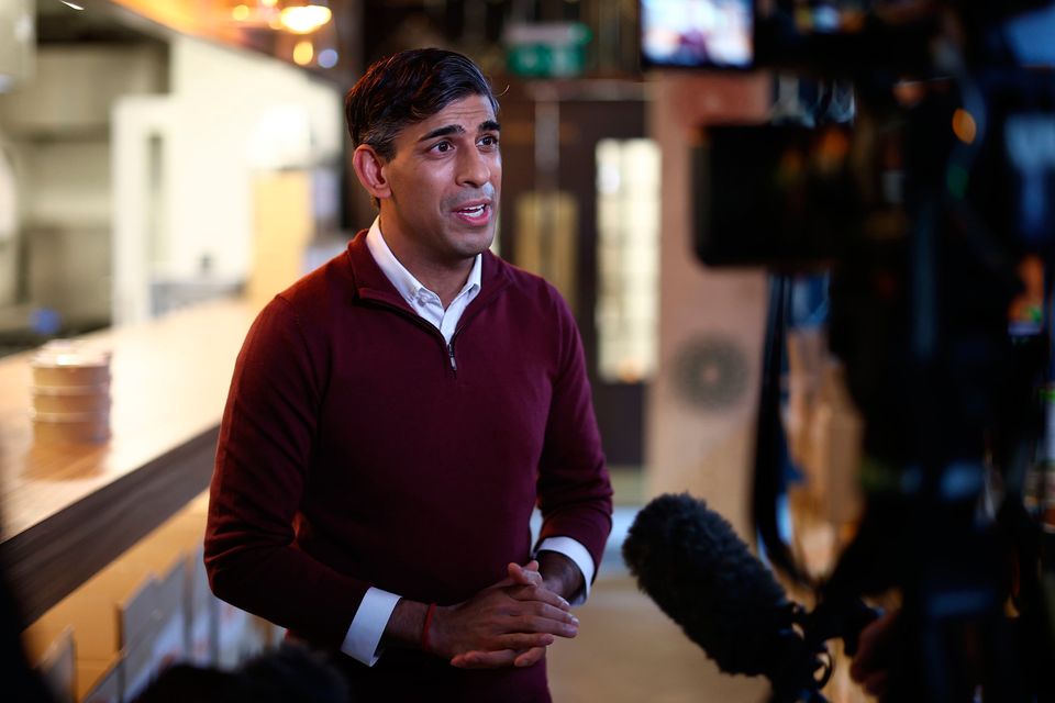 UK prime minister Rishi Sunak speaks to the media yesterday during a visit to OmNom, a restaurant and community centre in north London. Photo: PA