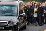 thumbnail: Mourners follow the coffin of Michael McCoy into St. Maelruain's Church of Ireland in Tallaght. Photo: Tony Gavin