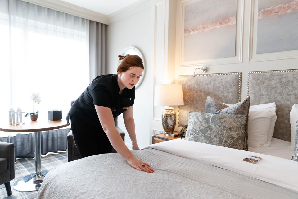 Preparing a room for guests at The Lakeside Hotel.