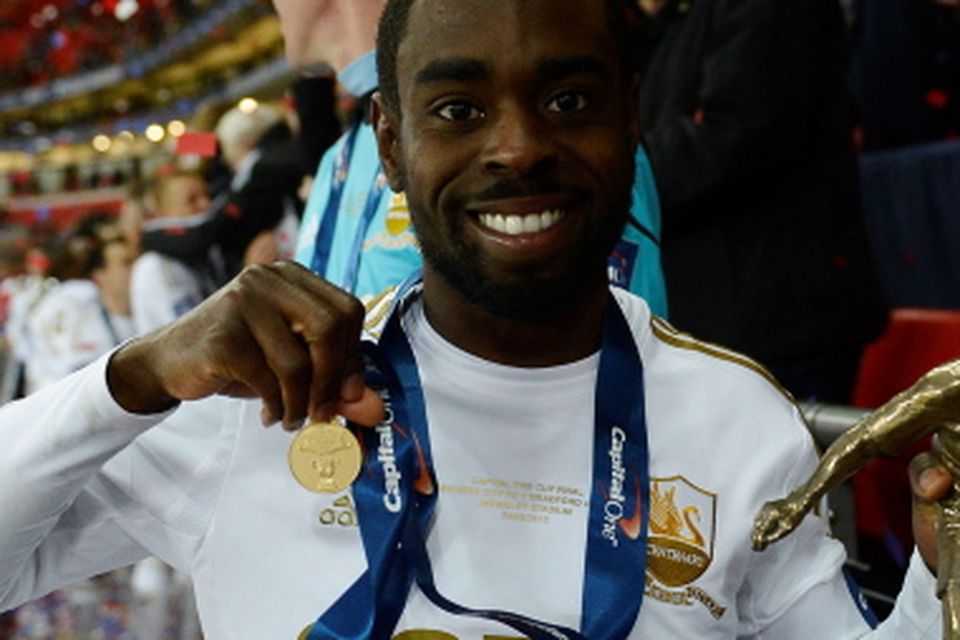 Swansea City's Nathan Dyer collects his man-of-the-match award after winning the Capital One Cup Final 5-0 at Wembley Stadium, London. PRESS ASSOCIATION Photo. Picture date: Sunday February 24, 2013. See PA story SOCCER Final. Photo credit should read: Tom Jenkins/Pool/PA Wire. RESTRICTIONS: Editorial use only. Maximum 45 images during a match. No video emulation or promotion as 'live'. No use in games, competitions, merchandise, betting or single club/player services. No use with unofficial audio, video, data, fixtures or club/league logos.