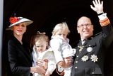 thumbnail: Prince Albert II of Monaco, right, with his wife Princess Charlene and their twins, Prince Jacques, right, and Princess Gabriella, attend from the Monaco palace to the Monaco's national day ceremony, in Monaco, Friday Nov. 19, 2016. Monaco's Fete Nationale has been celebrated since the reign of Prince Charles III in 1857. (AP Photo/Claude Paris)