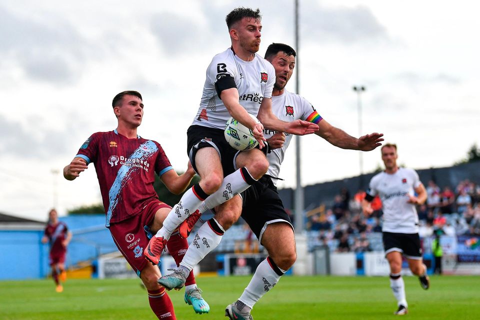 Dundalk players Archie Davies and Patrick Hoban, right, in action against Dayle Rooney of Drogheda United. Photo: Piaras Ó Mídheach/Sportsfile