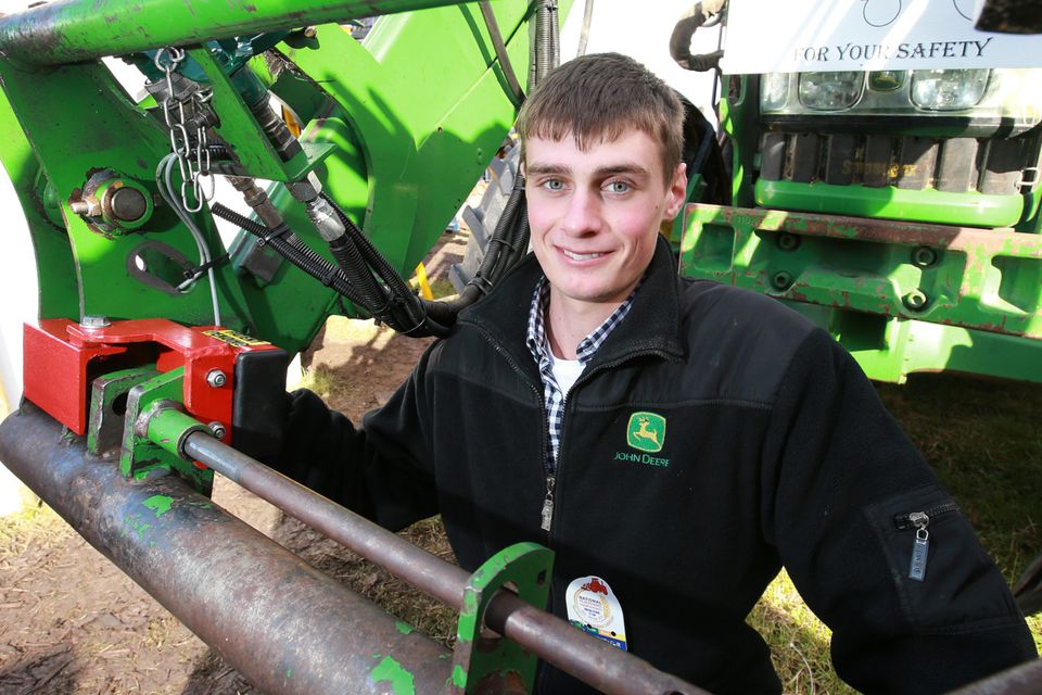 Ian Bolger picture with his Safe Attach anti-crush device for tractors which won the Young Innovation Award at the National Ploughing Championships. Photo: Frank McGrath.