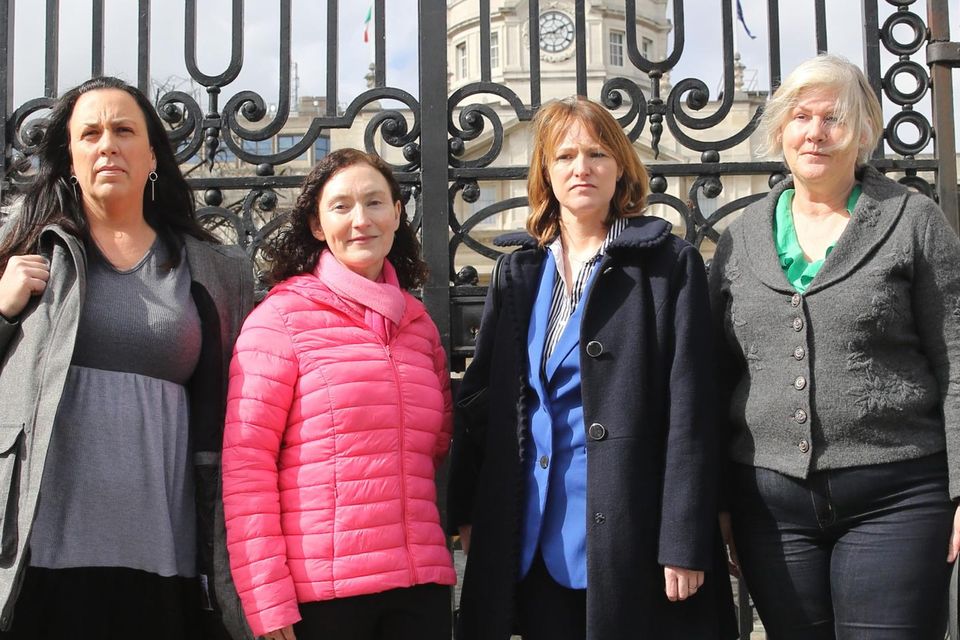 Women of Honour: Honor Murphy, Yvonne O'Rourke, Diane Byrne, and Karina Molloy outside Government Buildings in Dublin. Photo: Collins