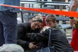 thumbnail: People react after a 14-year-old boy opened fire on other students and security guards at a school in downtown Belgrade, Serbia, May 3, 2023. REUTERS/Djordje Kojadinovic TPX IMAGES OF THE DAY
