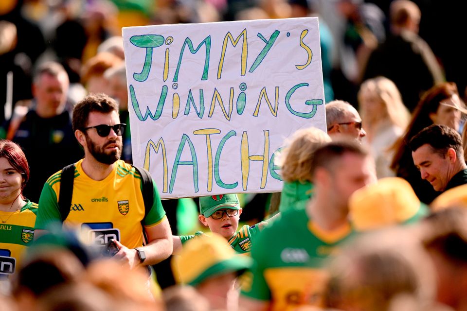 A Donegal supporter holds a 'Jimmy's winning matches' sign after the All-Ireland SFC preliminary quarter-final win over Louth at MacCumhaill Park in Ballybofey, Donegal. Photo: Ramsey Cardy/Sportsfile