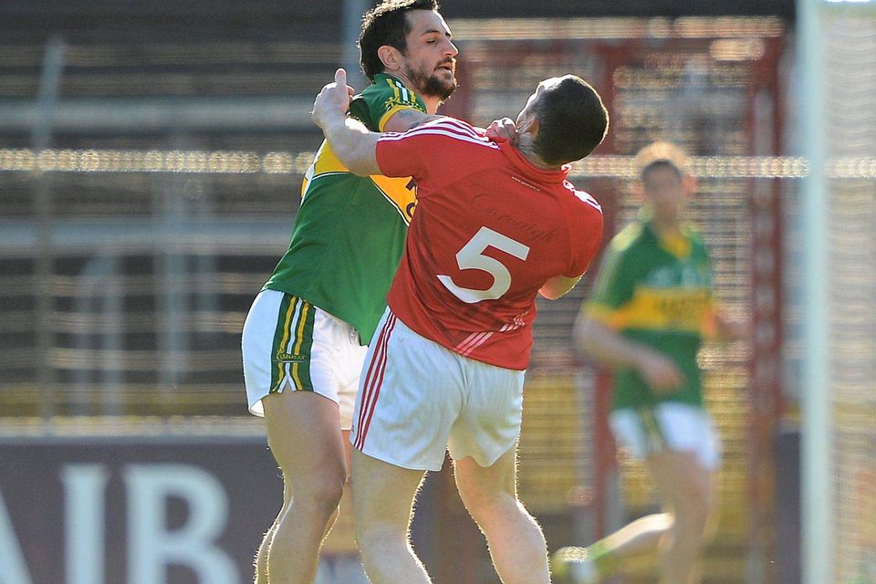 Kerry's Paul Galvin and Cork's Noel O'Leary tussle during their 2012 Allianz FL Division 1 encounter at Páirc Uí Chaoimh. Photo: Stephen McCarthy/Sportsfile