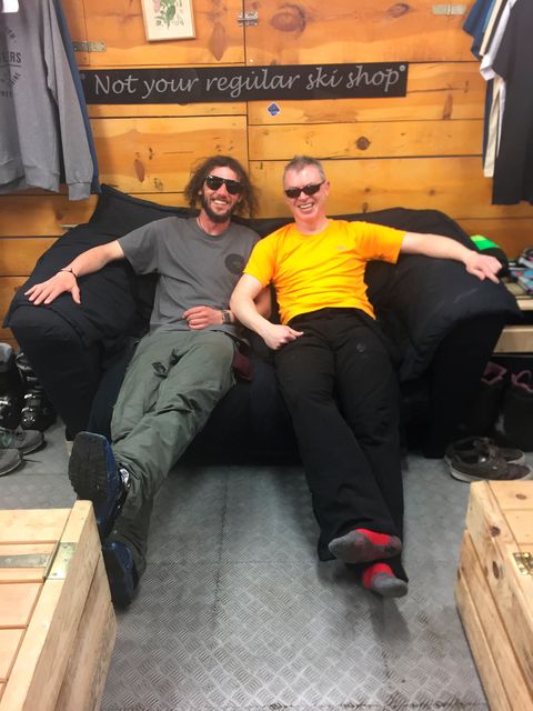 Joe with Chris Gardiner: Going through the door of Ski Pas is to enter a different world