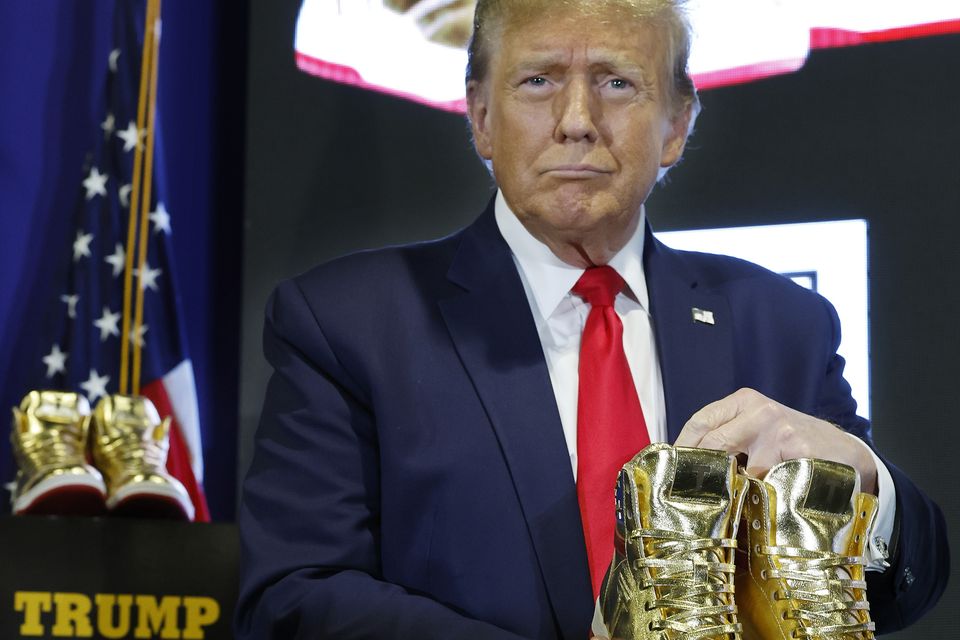 The president of the United States, Donald Trump, held a couple of high gold tops 'never to perform'. Photo: Getty