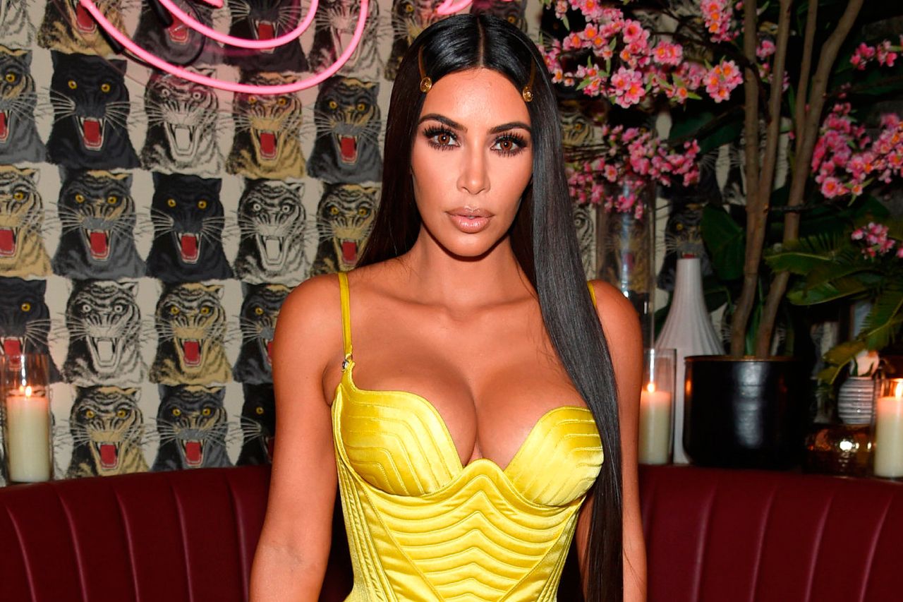 She's her own best ad! Kim Kardashian flashes Spanx in skintight Versace  dress