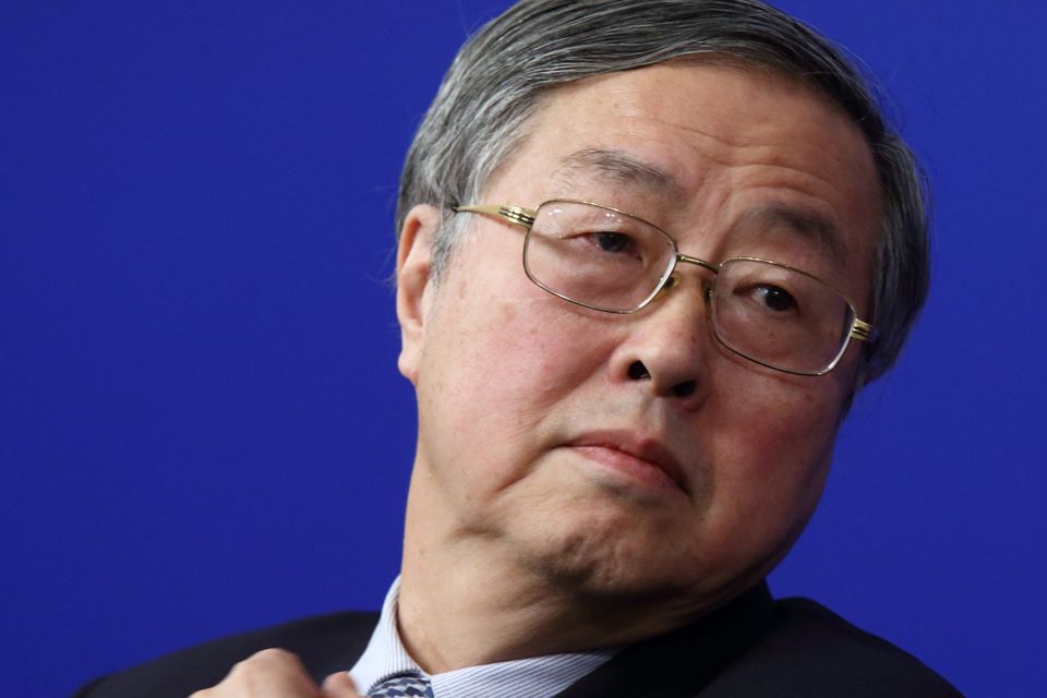Zhou Xiaochuan, governor of the People's Bank of China (PBOC), attends a news conference in Beijing, China, on Thursday, March 12, 2015. China's central bank is pushing ahead with plans to liberalize interest rates even as the economy slows, a reform that would effectively end a dual-track rate system that has seen savers subsidize decades of investment-fueled growth. Photographer: Tomohiro Ohsumi/Bloomberg