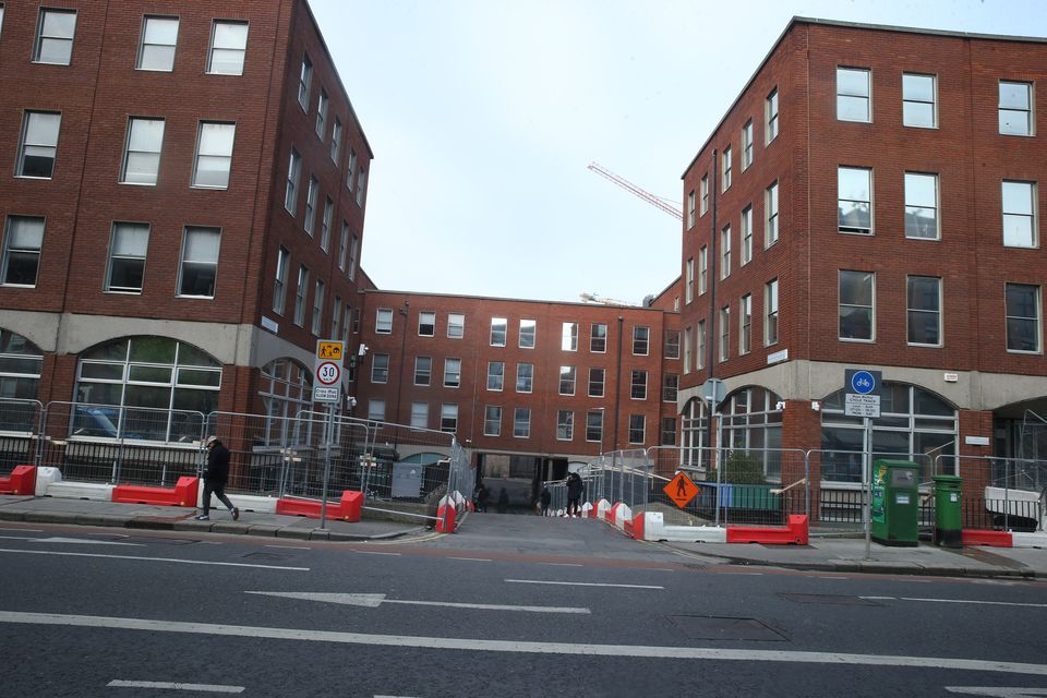 Barriers around the International Protection Office in Dublin after a ‘tent city’ was cleared from the area on Wednesday. Photo: Collins