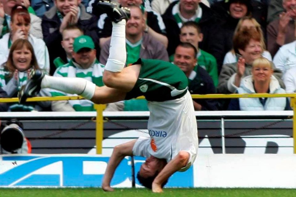 Robbie Keane celebrates his goal against Celtic, during the Jackie McNamara testimonial match at Celtic Park in May 29, 2005, with his trademark cartwheel. Pic: Steve Welsh/PA.