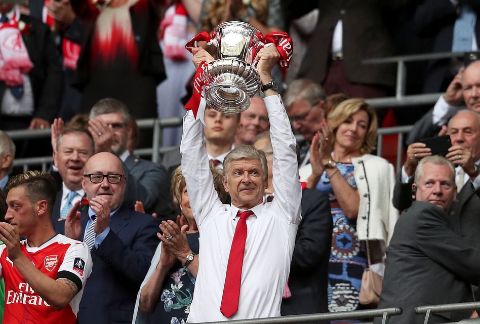 Arsene Wenger lifts the FA Cup after Arsenal’s win over Chelsea in 2017 (Adam Davy/PA)