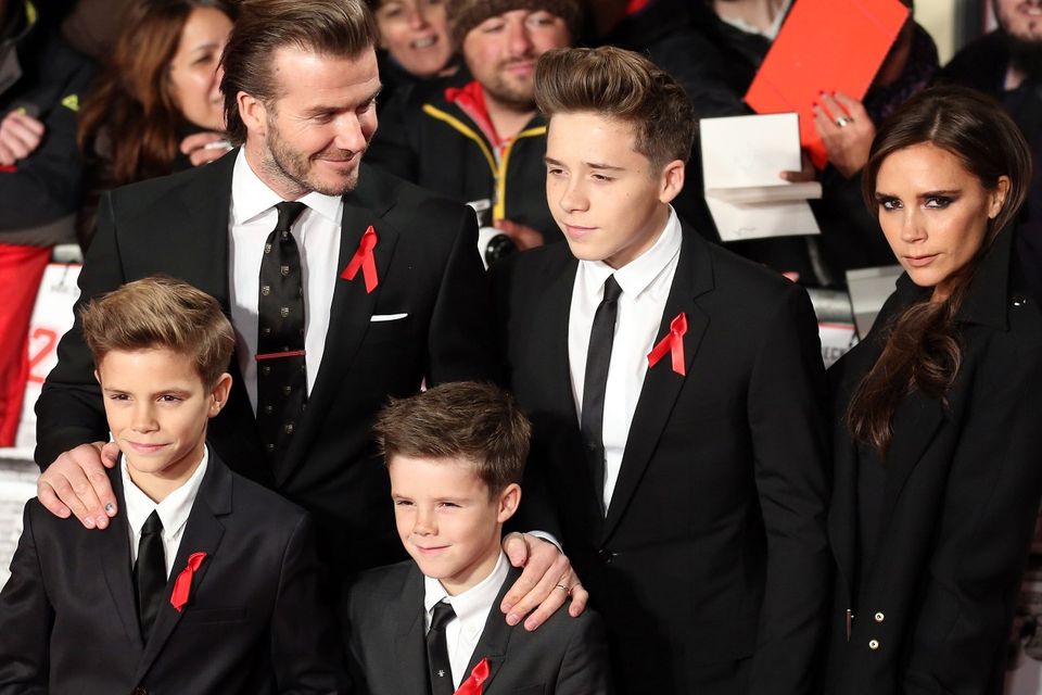 David and Victoria Beckham with their sons Brooklyn, Romeo and Cruz