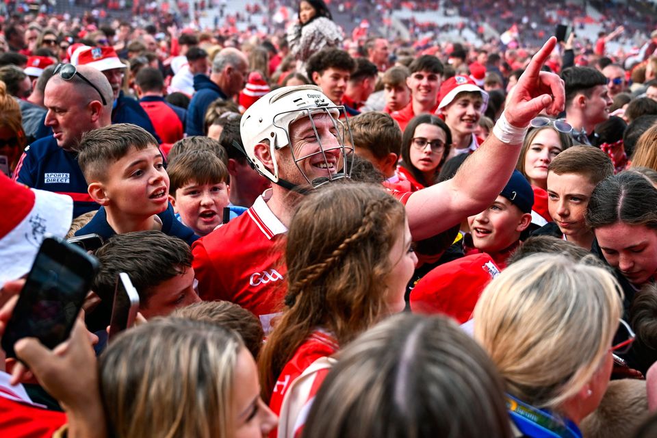 Patrick Horgan of Cork on the pitch with supporters after his side's victory