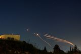 thumbnail: Israel's Iron Dome anti-missile system intercepts rockets launched from Lebanon towards Israel. Photo: Reuters