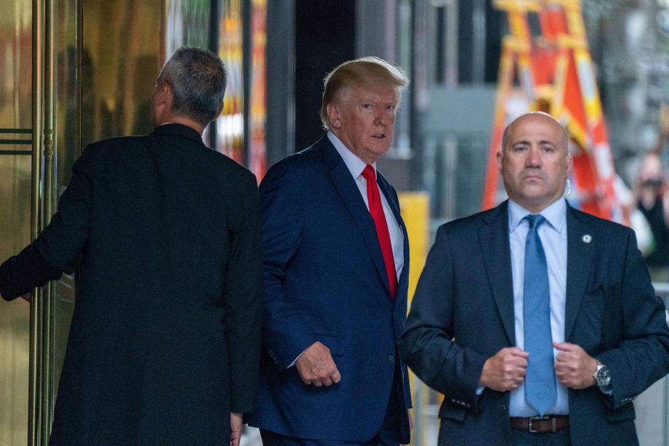 Donald Trump departs Trump Tower for a deposition in New York. Photo: Reuters/David Delgado