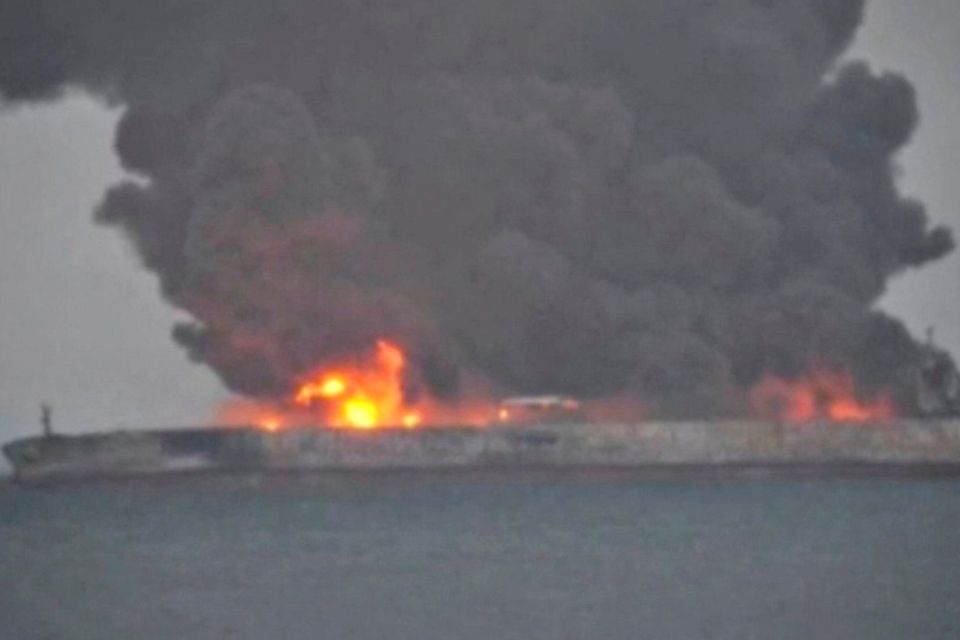 Smoke and fire is seen from Panama-registered tanker SANCHI carrying Iranian oil after it collided with a Chinese freight ship in the East China Sea, in this still image taken from a January 7, 2018 video.