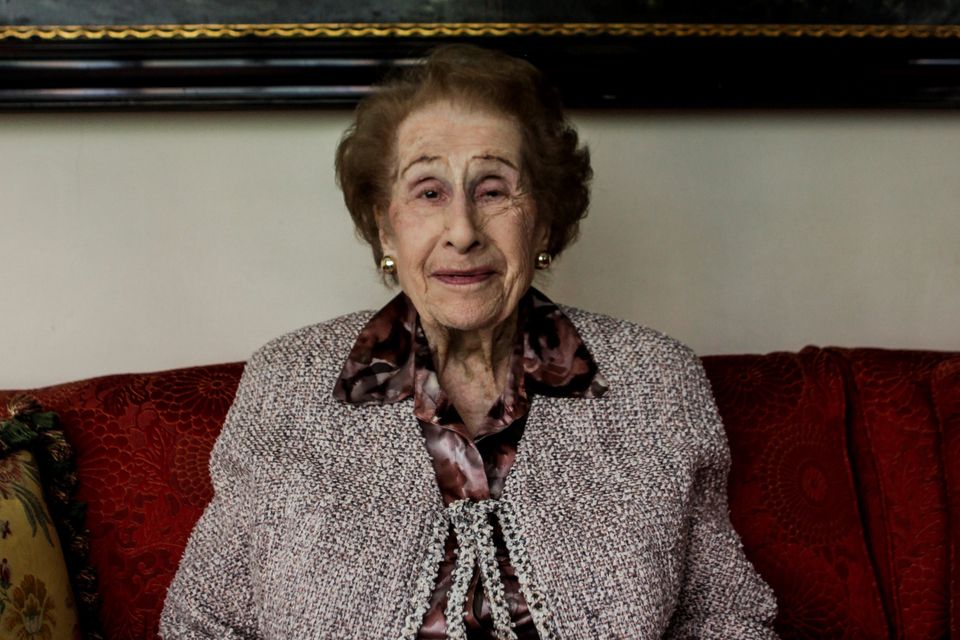99-year-old Irene Bergman, financial adviser at Stralem & Co., sits for a photograph at her home in New York, U.S., on Saturday, May 30, 2015. As one of the oldest working professionals in an industry run by men half her age, Bergman offers a rare perspective. She recalls the small private firms founded by German Jews of the 19th century that came to define Wall Street before their partnership model gave way to public listings, and honor succumbed to an ever-fiercer push for profit. Photographer: Chris Goodney/Bloomberg