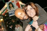 thumbnail: Michelle Mulherin with Danson Kole at an election centre a number of years ago