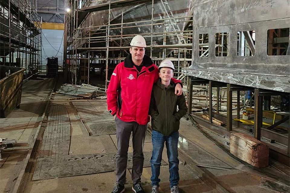 Liam O'Brien of Doolin Ferry, inspecting the new build with son Conor