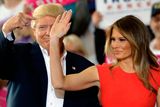 thumbnail: President Donald Trump points to his wife, first lady Melania Trump during a campaign rally Saturday, Feb. 18, 2017, at Orlando-Melbourne International Airport, in Melbourne, Fla. (AP Photo/Chris O'Meara)