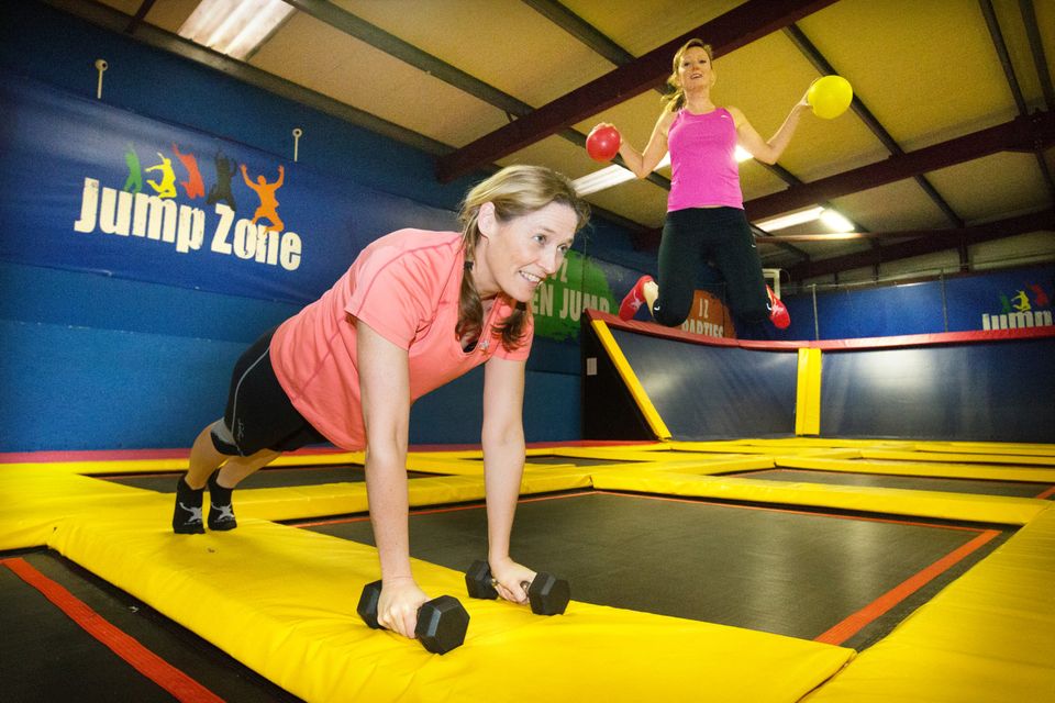 Spring in their step: Roisin Finlay and Helen Vaughan get some trampoline excersise in Jump Zone
