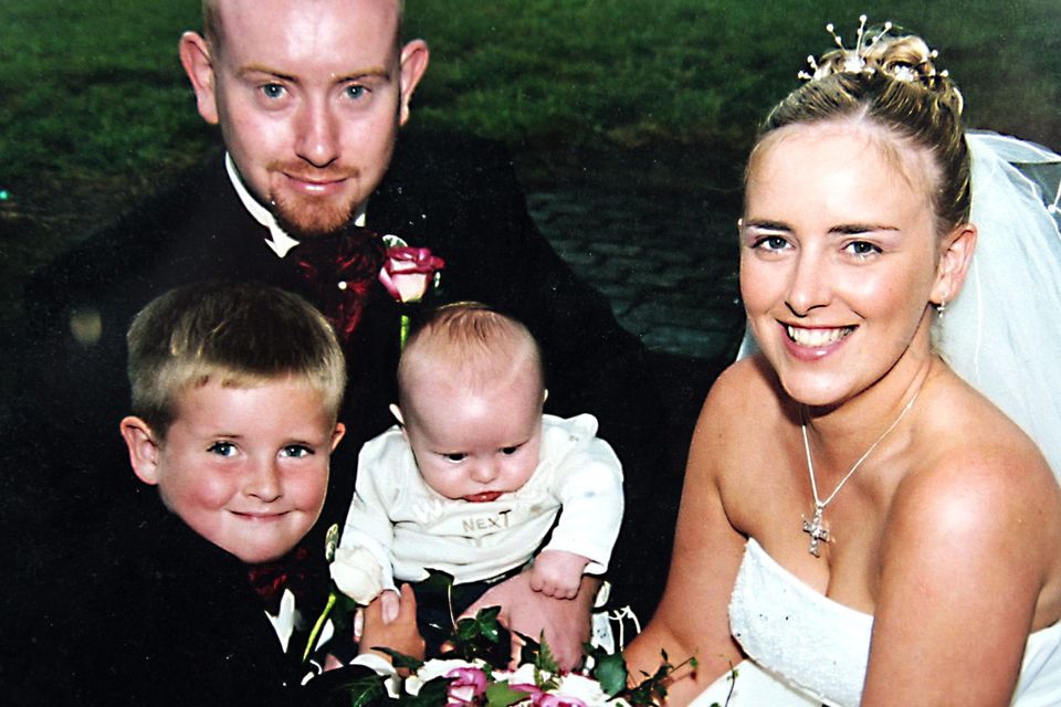 Stephen Hampson, on his wedding day, with his wife Aisling  and sons Ryan and Joshua
