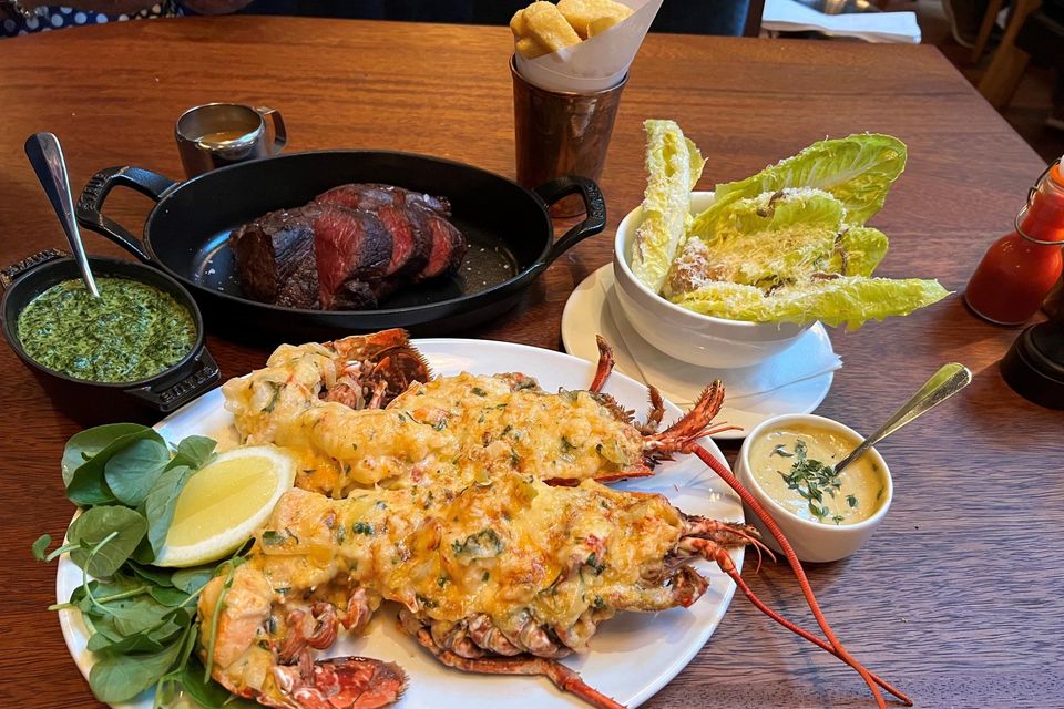 "Hawksmoor, being basically all about the beef they boast of, are using, among others, the John Stone beef brand supplied by Kepak in Co Longford." Dublin Lawyer lobster flanked by creamed spinach, Chateaubriand, triple-cooked chips and Hawksmoor Caesar salad. Photo: Lucinda O'Sullivan