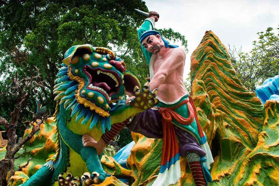 A statue depicting a scene from Chinese mythology at Haw Par Villa. PA Photo/Nilima Marshall.