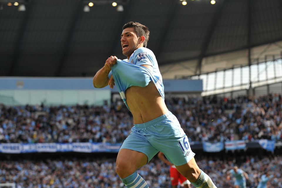 Sergio Aguero wheels away in celebration after scoring his iconic goal against QPR which won the Premier League for Manchester City in 2012