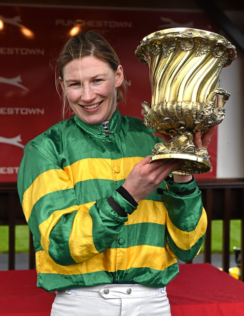 26 April 2016; Jockey Nina Carberry lifts the trophy after winning the Kildare Hunt Club Fr Sean Breen Memorial Steeplechase on Wish Ye Didnt. Punchestown, Co. Kildare. Picture credit: Paul Mohan / SPORTSFILE