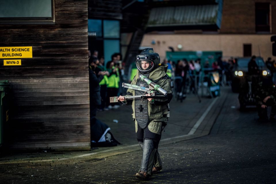 Explosive Ordnance Division (EOD) makes his way to safely detonate a bomb at the largest ever immersive simulation thrusts students into emergency situation at University of Limerick. Photo: Brian Arthur