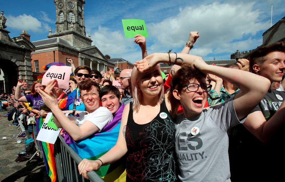 Supporters for same-sex marriage raise a cheer at Dublin Castle as they wait for the result of the referendum on May 23, 2015. Yes voters were basking in the sunshine today as they gathered to celebrate an expected victory in Ireland's referendum on whether to approve same-sex marriage.
AFP PHOTO /  Paul FaithPAUL FAITH/AFP/Getty Images