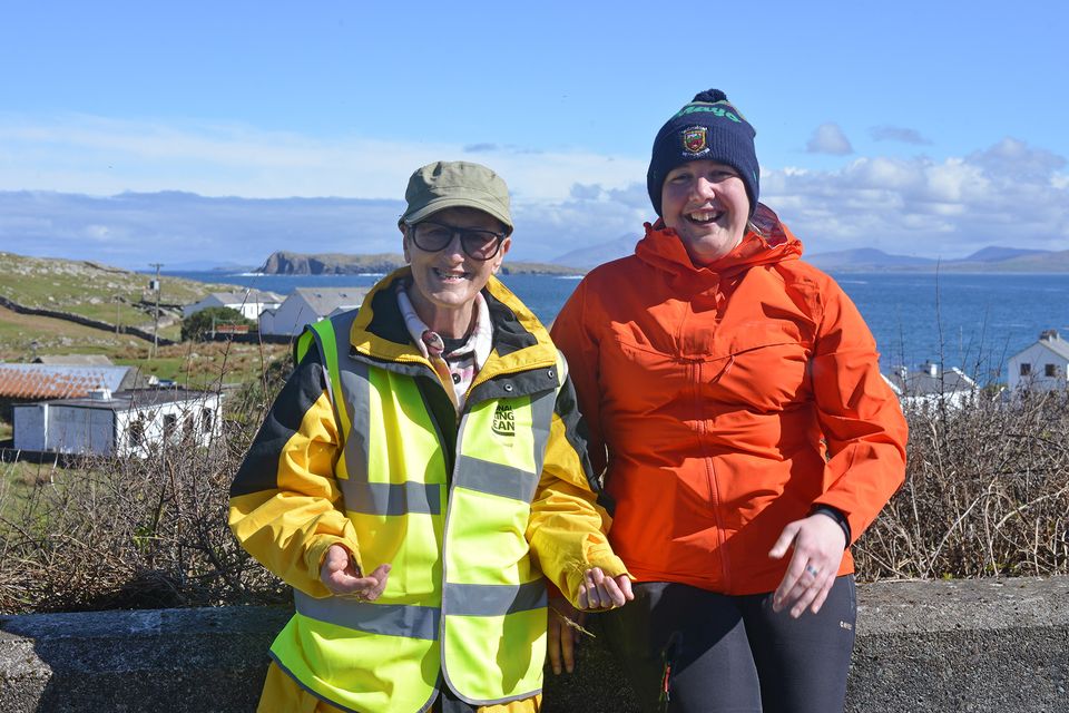 Phylomena Heaney (left) and Deborah Bennett above 'The City' on Inishturk. Photo: Pól Ó Conghaile