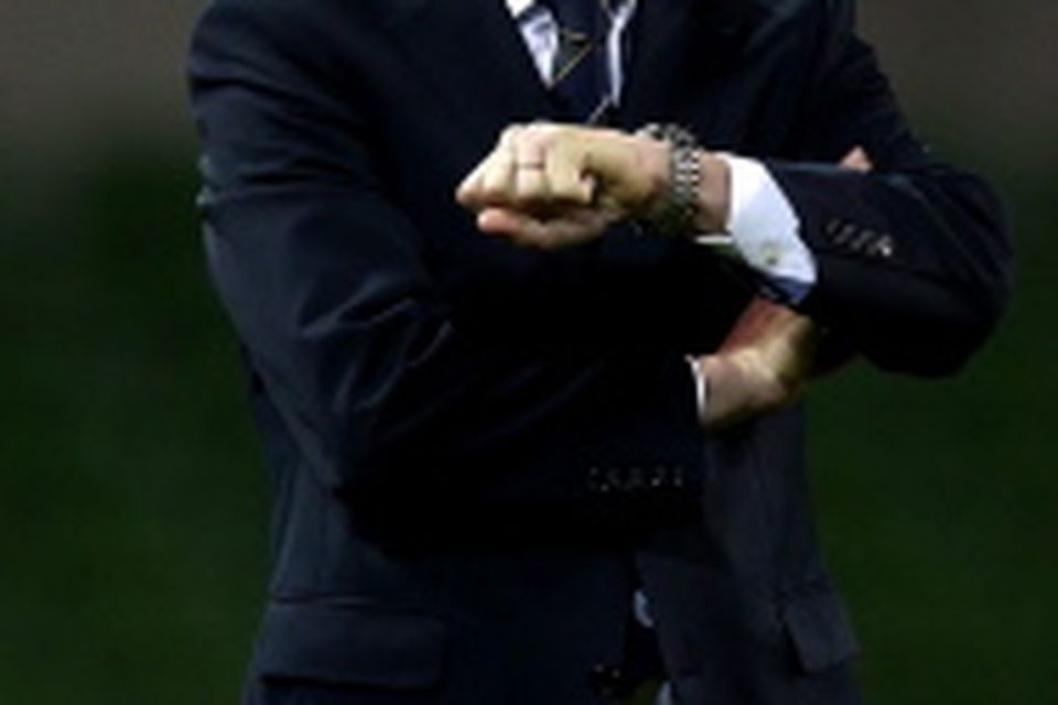 Giovanni Trapattoni of Ireland checks his watch during the International friendly between Ireland and Greece at the Aviva Stadium on November 14, 2012