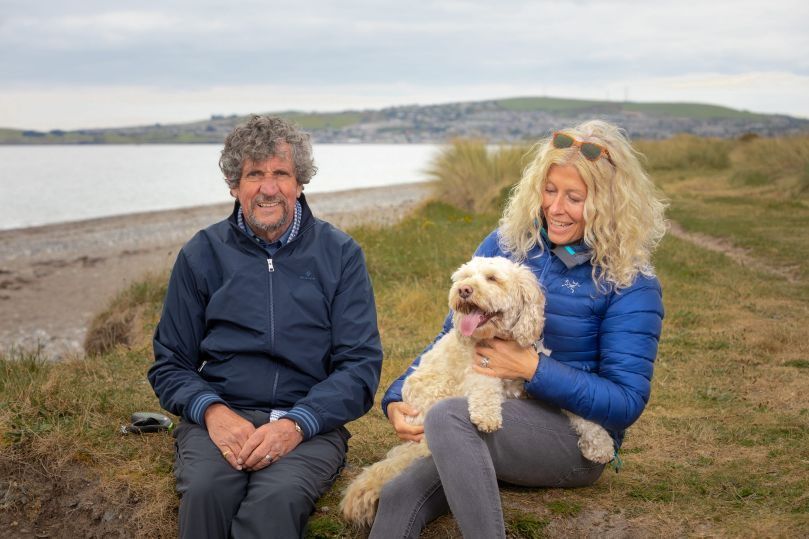 Charlie Bird with his wife Claire Mould and their dog Tiger. Photo: Owen Breslin