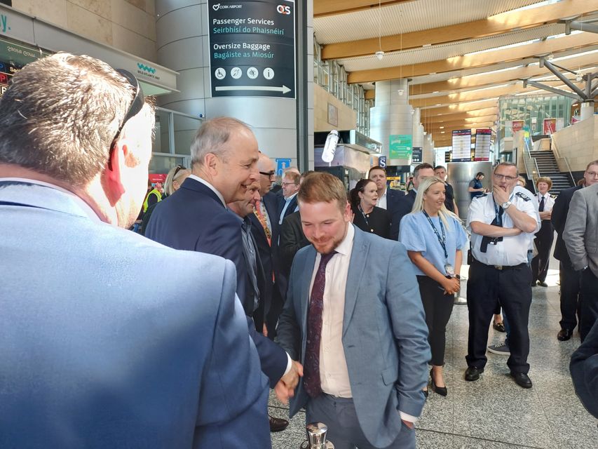 Taoiseach Micheál Martin and Sinn Féin's Donnchadh O'Laoghaire shaking hands at the launch