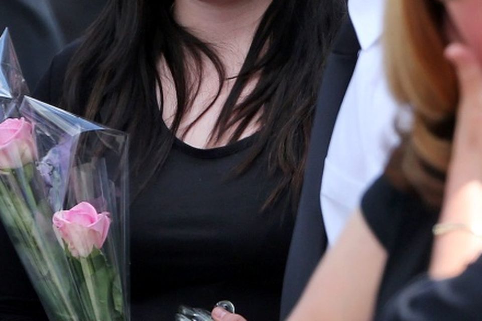 Angela Kelly's daughter, Shannon and the sole survivor of the accident, Jamie Kelly at the funeral of Angela Kelly who was one of three people killed in a car crash last Sunday at Middlemount on the R433 Rathdowney to Abbeyleix Road