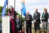 thumbnail: The wind plays a trick on Archbishop Michael Neary as he prays for the victims