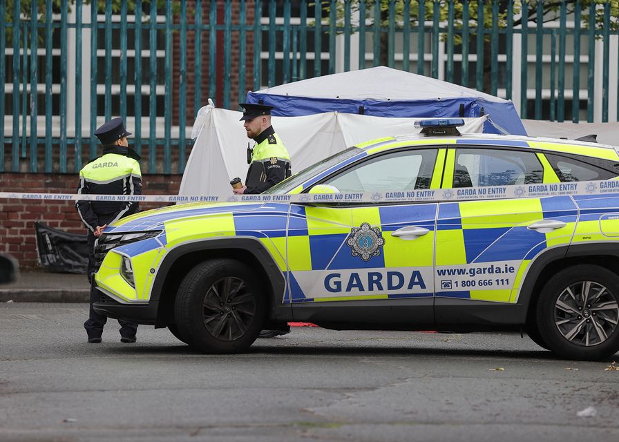 Gardaí at the scene of the fatal shooting at Knocknarea Road in Drimnagh. Photo: Frank McGrath